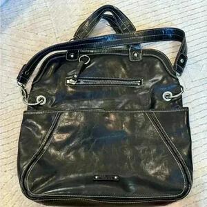 Black leather Nine West woman’s fold over purse